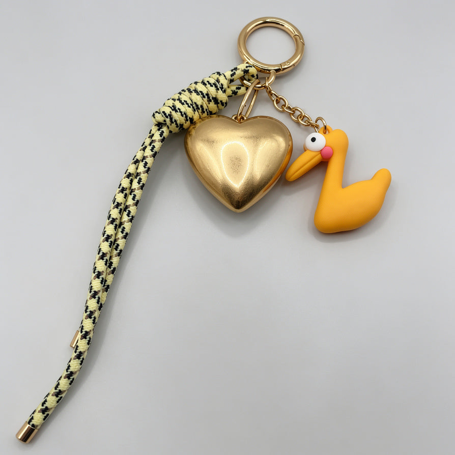 Llavero de Corazón Dorado y Cisne Amarillo - Accesorio de Moda para Llaveros, Pedidos al Por Mayor|JI JOYA