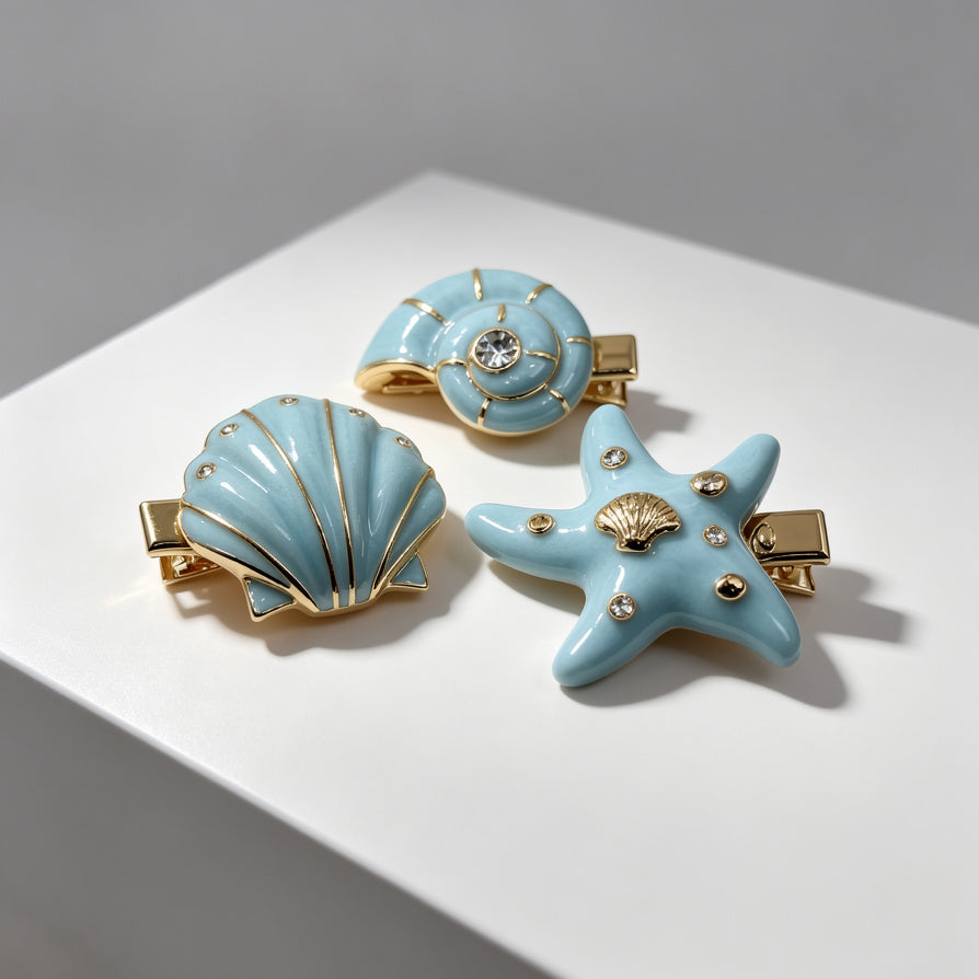 Set de 3 Pinzas para el Cabello de Estilo Marino - Concha, Estrella de Mar y Caracol, Baño de Oro y Esmalte Azul, al Por Mayor|JI JOYA