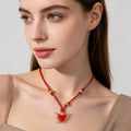 Collar de Cuerda Roja con Colgante de Mariposa de Cristal - Diseño Étnico y Moderno, Venta al Por Mayor|JI JOYA
