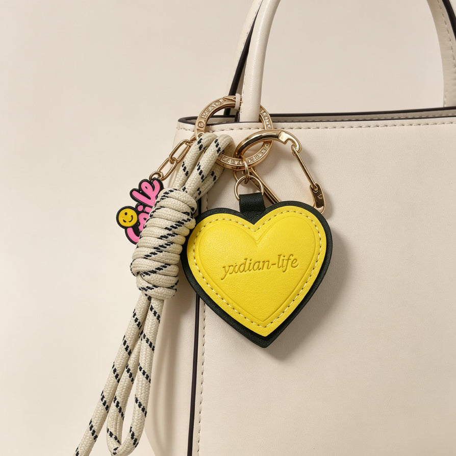 Llavero de Moda con Corazón Amarillo y Cordón Trenzado - Venta al Por Mayor|JI JOYA