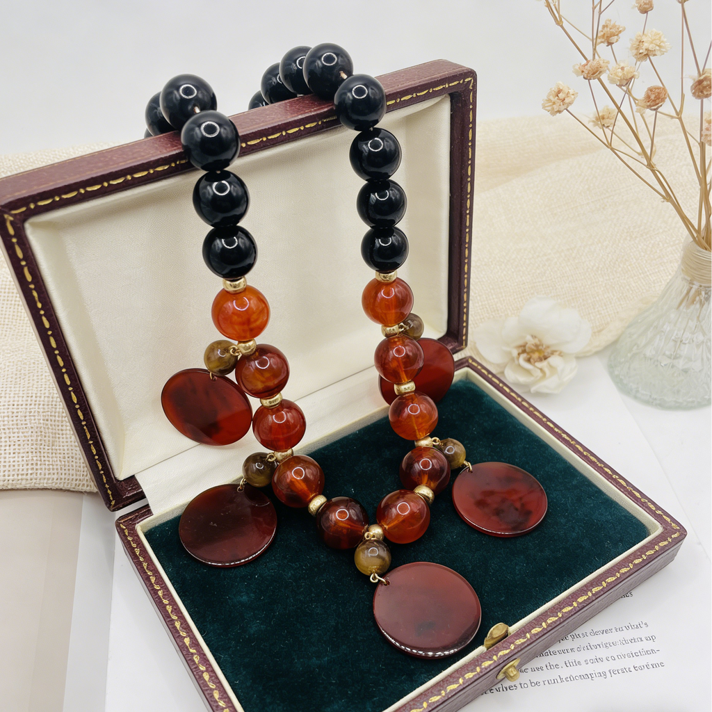 Bohemian chic reddish-brown beaded necklace with golden details | Handmade resin pendant necklace
