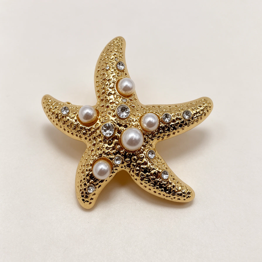 Broche Estrella de Mar Dorado con Perlas - Accesorio Elegante para Mujeres - Mayorista|JI JOYA