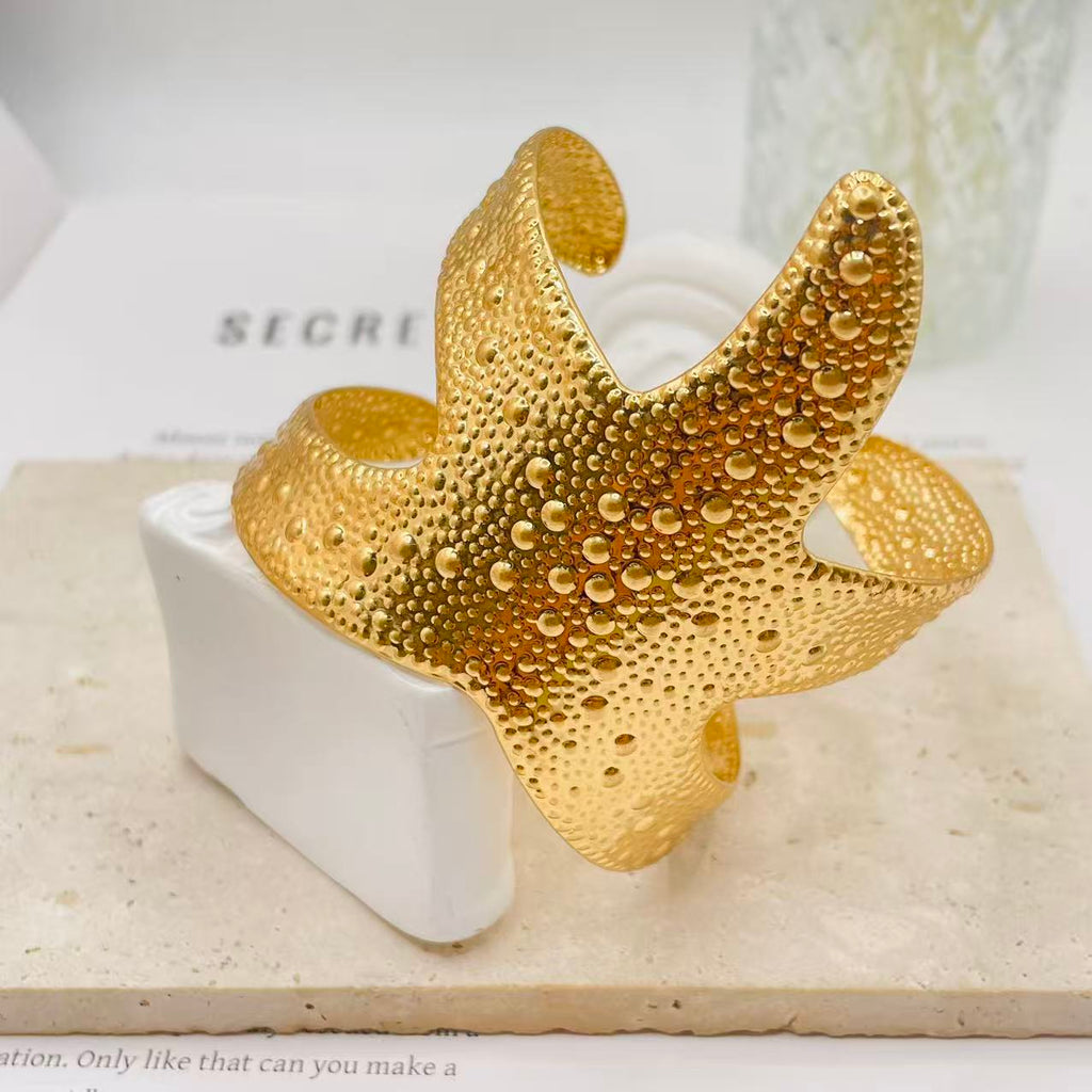 Pulsera Brazalete Estrella de Mar - Dorado/Palateado | Joyería de Moda para Mujer | Mayorista
