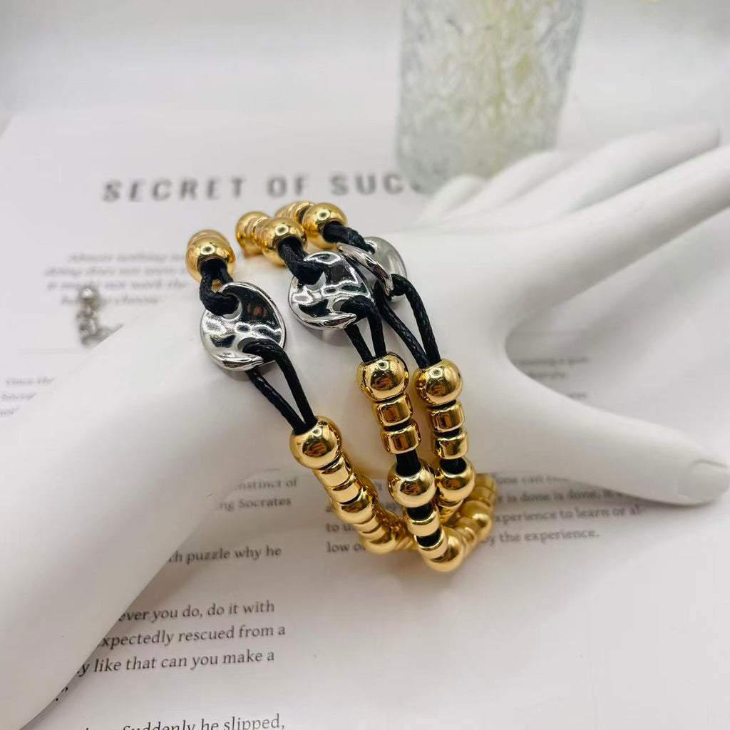 JI JOYA VENTA AL POR MAYOR|Pulsera de Moda Dorada y Plateada con Cordón Negro | Joyería al Por Mayor para Mujeres