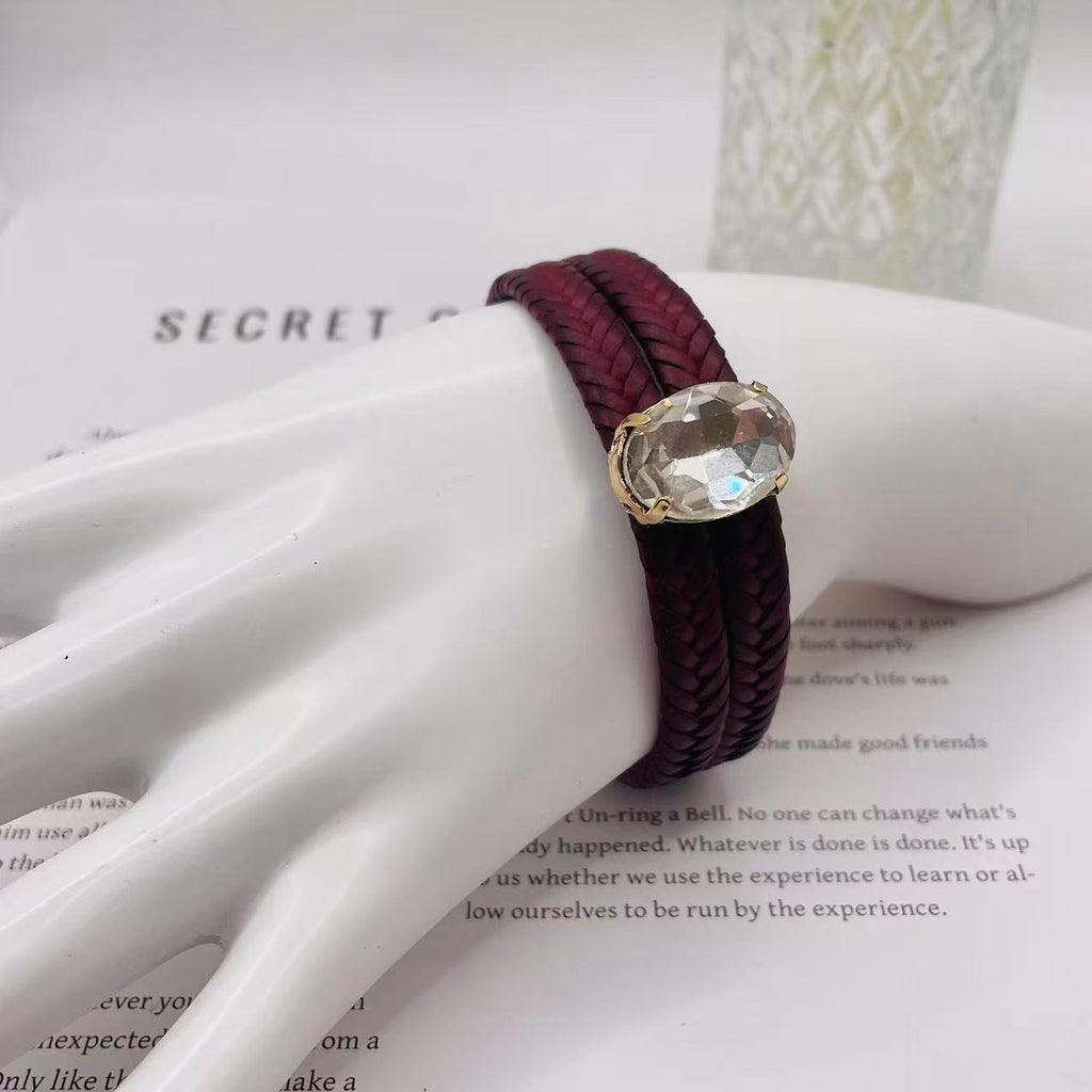 JI JOYA VENTA AL POR MAYOR|Pulsera Trenzada de Cuero con Piedra de Cristal Ovalada | Moda Elegante para Mujer | 2 Colores Disponibles (Vino Negro) | Joyería al Por Mayor