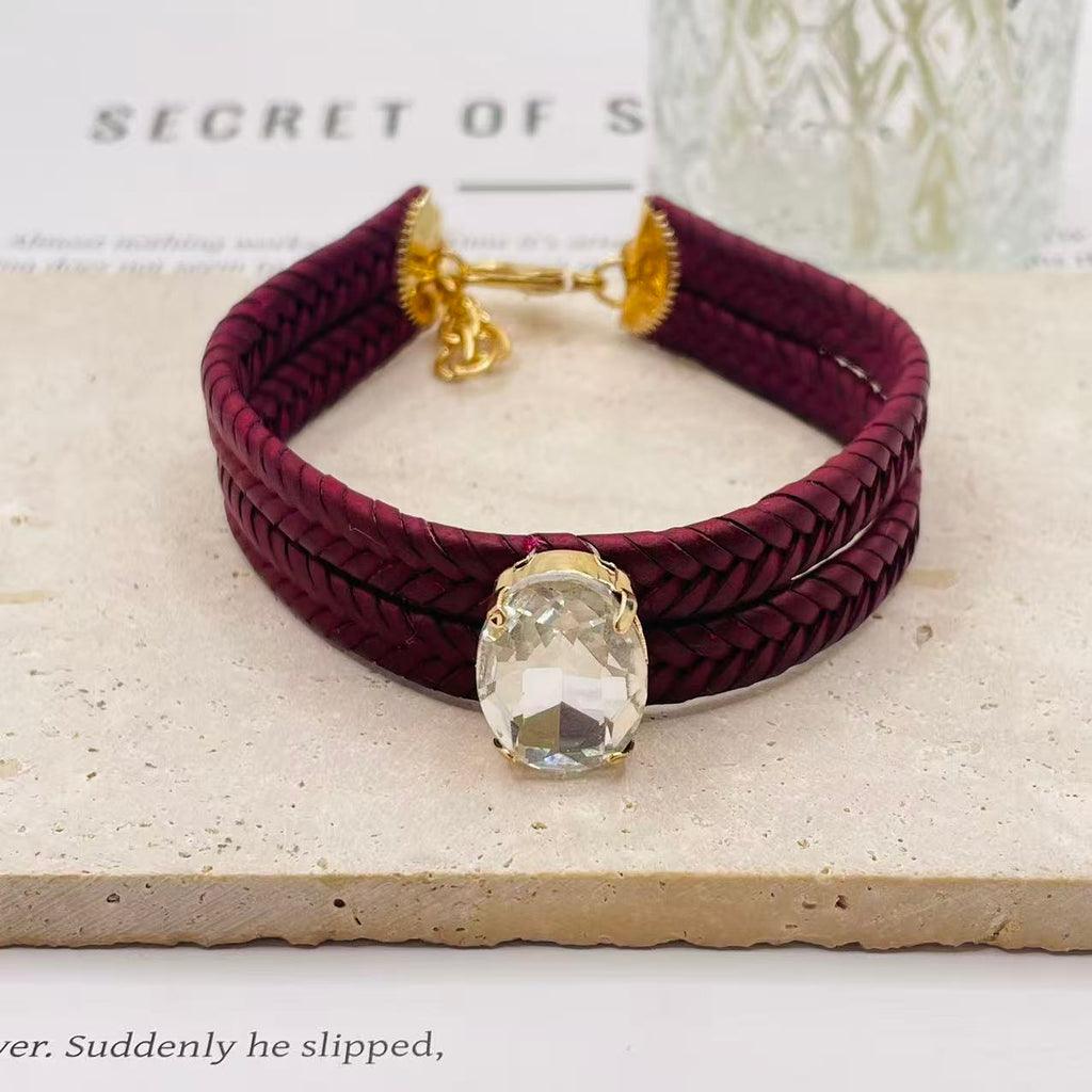 JI JOYA VENTA AL POR MAYOR|Pulsera Trenzada de Cuero con Piedra de Cristal Ovalada | Moda Elegante para Mujer | 2 Colores Disponibles (Vino Negro) | Joyería al Por Mayor