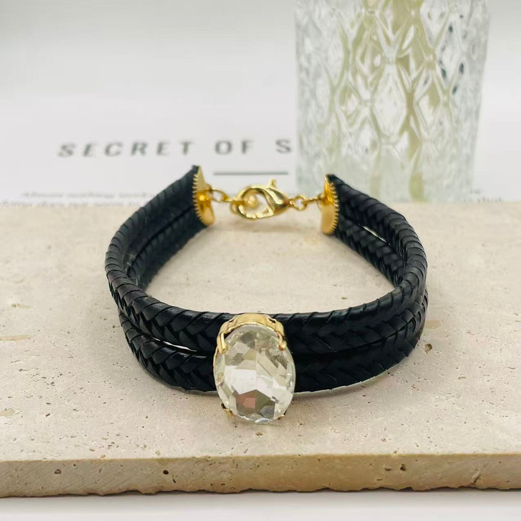 JI JOYA VENTA AL POR MAYOR|Pulsera Trenzada de Cuero con Piedra de Cristal Ovalada | Moda Elegante para Mujer | 2 Colores Disponibles (Vino Negro) | Joyería al Por Mayor