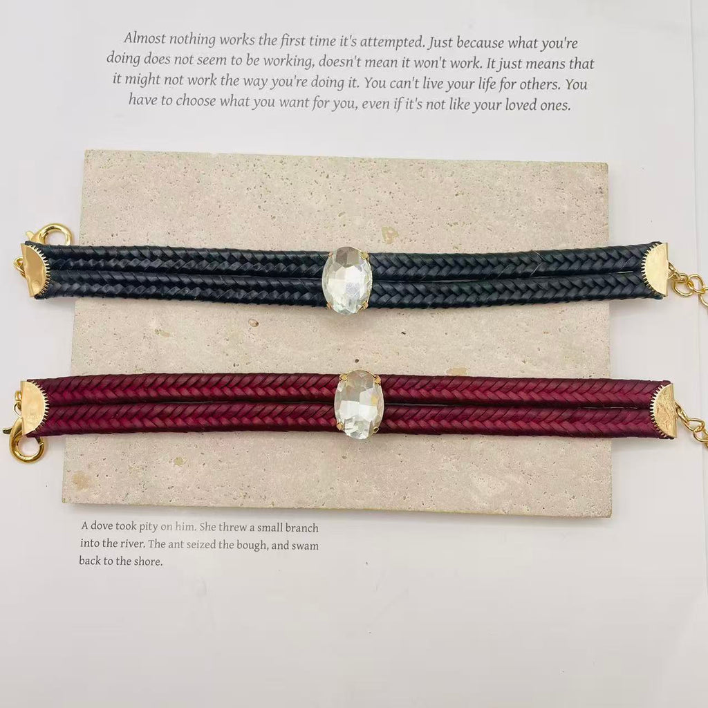 JI JOYA VENTA AL POR MAYOR|Pulsera Trenzada de Cuero con Piedra de Cristal Ovalada | Moda Elegante para Mujer | 2 Colores Disponibles (Vino Negro) | Joyería al Por Mayor