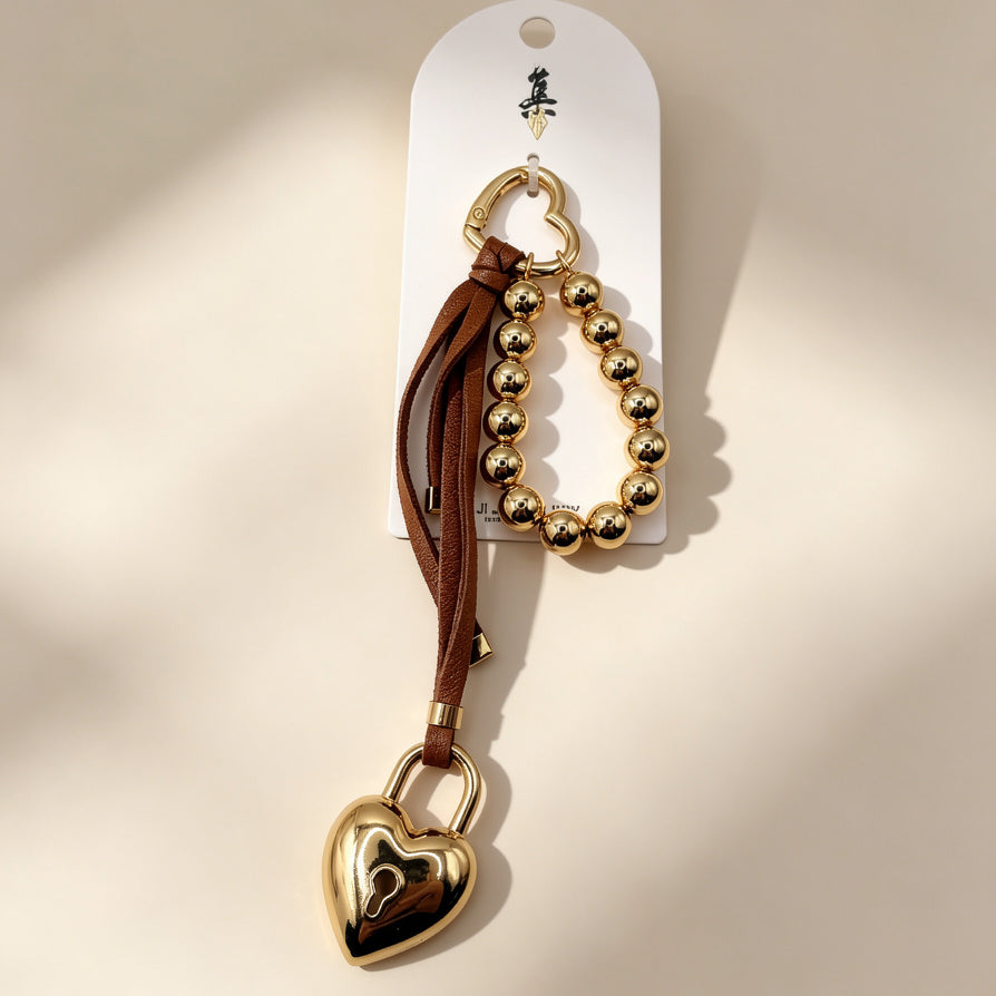 Llavero de Bolso Corazón Dorado con Cierre de Candado y Perlas de Metal, Accesorio de Moda para Mayoristas|JI JOYA