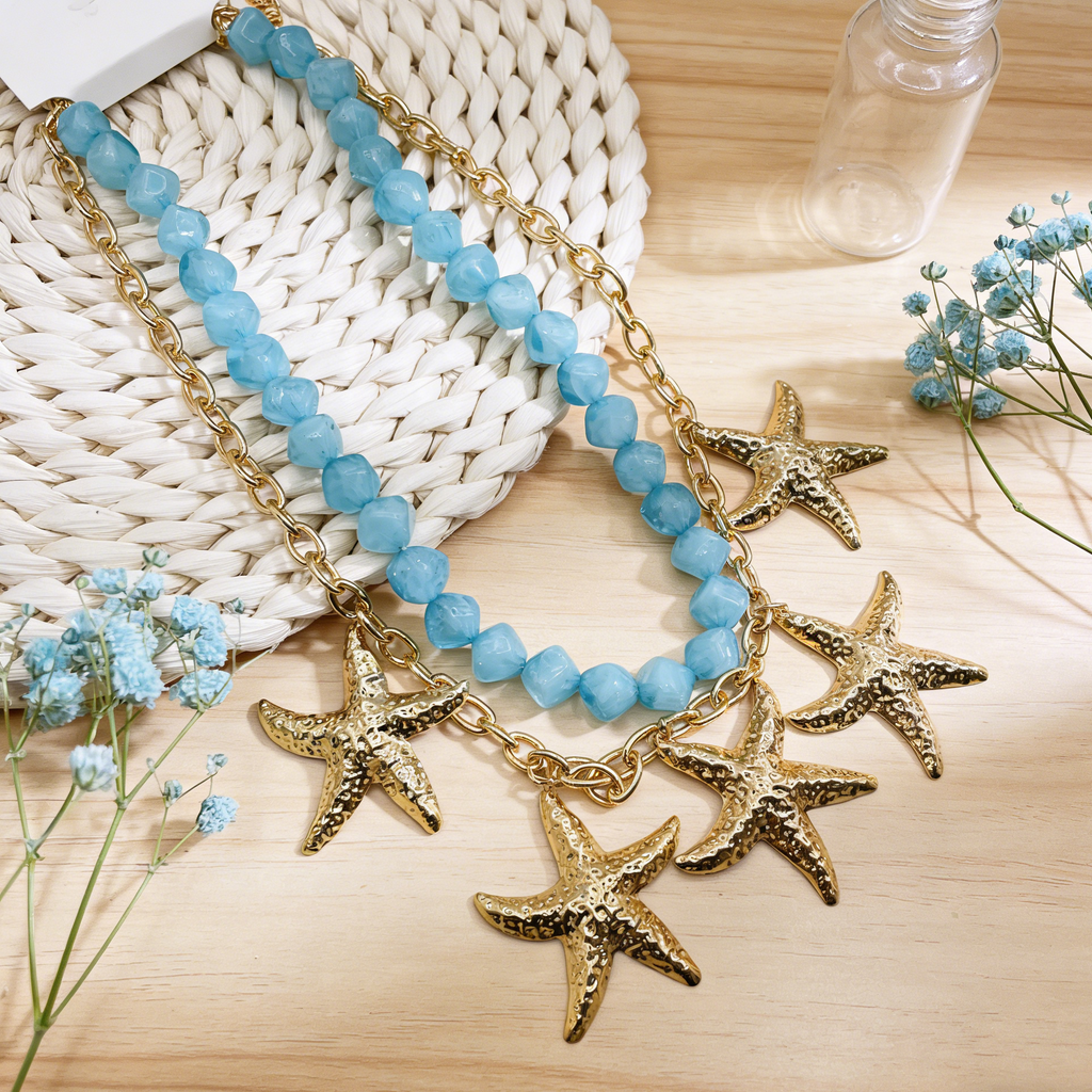 Collar de Declaración con Estrellas de Mar Doradas y Cuentas - Joyería Costera de Verano
