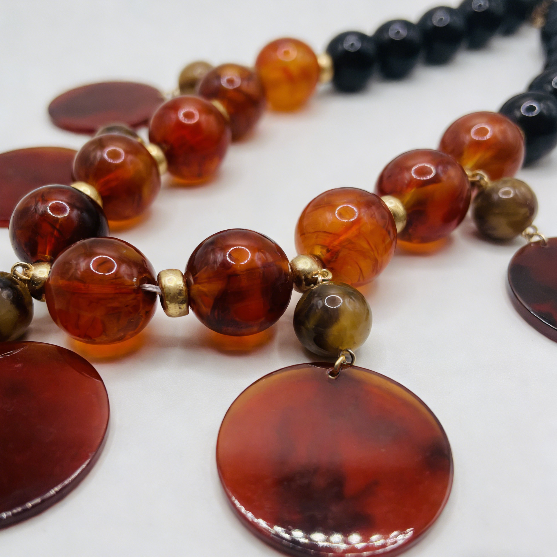 Bohemian chic reddish-brown beaded necklace with golden details | Handmade resin pendant necklace