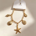 Pulsera con dijes marinos | Estrella de mar y conchas | Dorada/Plateada | Joyería al por mayor para mujer|JI JOYA