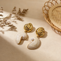 Pendientes de Inspiración Marina con Espiral Dorada y Perla