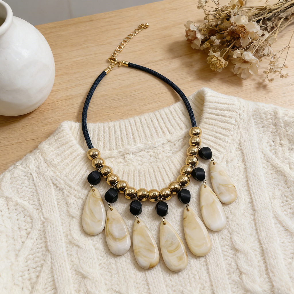 Conjunto de joyas de resina con forma de lágrima de inspiración retro: collar y pendientes llamativos