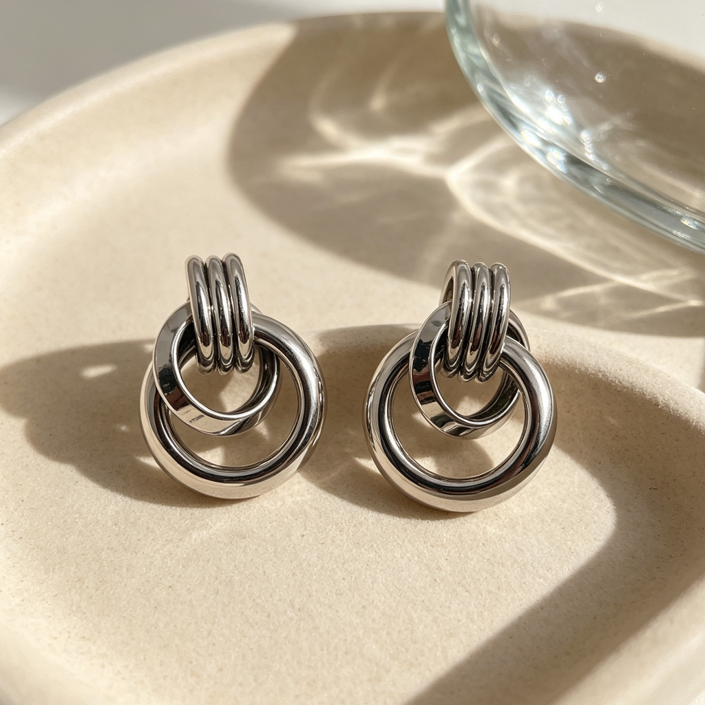 Pendientes Argolas Entrelazadas Metal Dorado & Plata | Mayorista Joyas Moda|JI JOYA