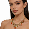 Conjunto de joyería bohemia vintage con borlas, collar y pulsera de piedra naranja chapados en oro para mujer