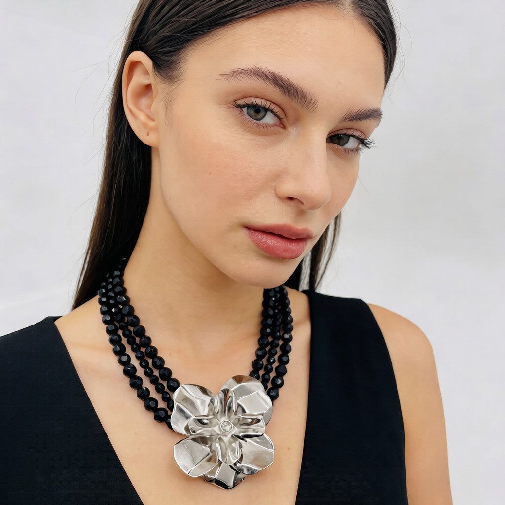 Black pearl necklace with silver floral embellishment - Luxury accessory for special occasions