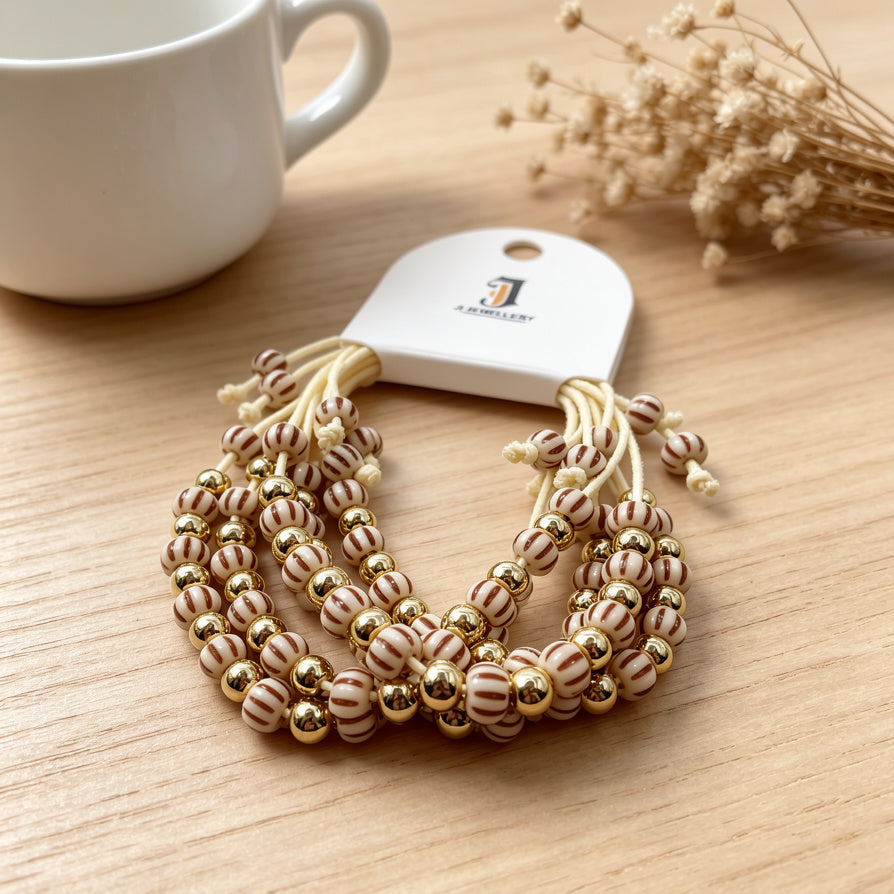 Pulseras de Cuentas Rayadas Doradas al Por Mayor | JI JOYA Bisutería de Moda al Por Mayor