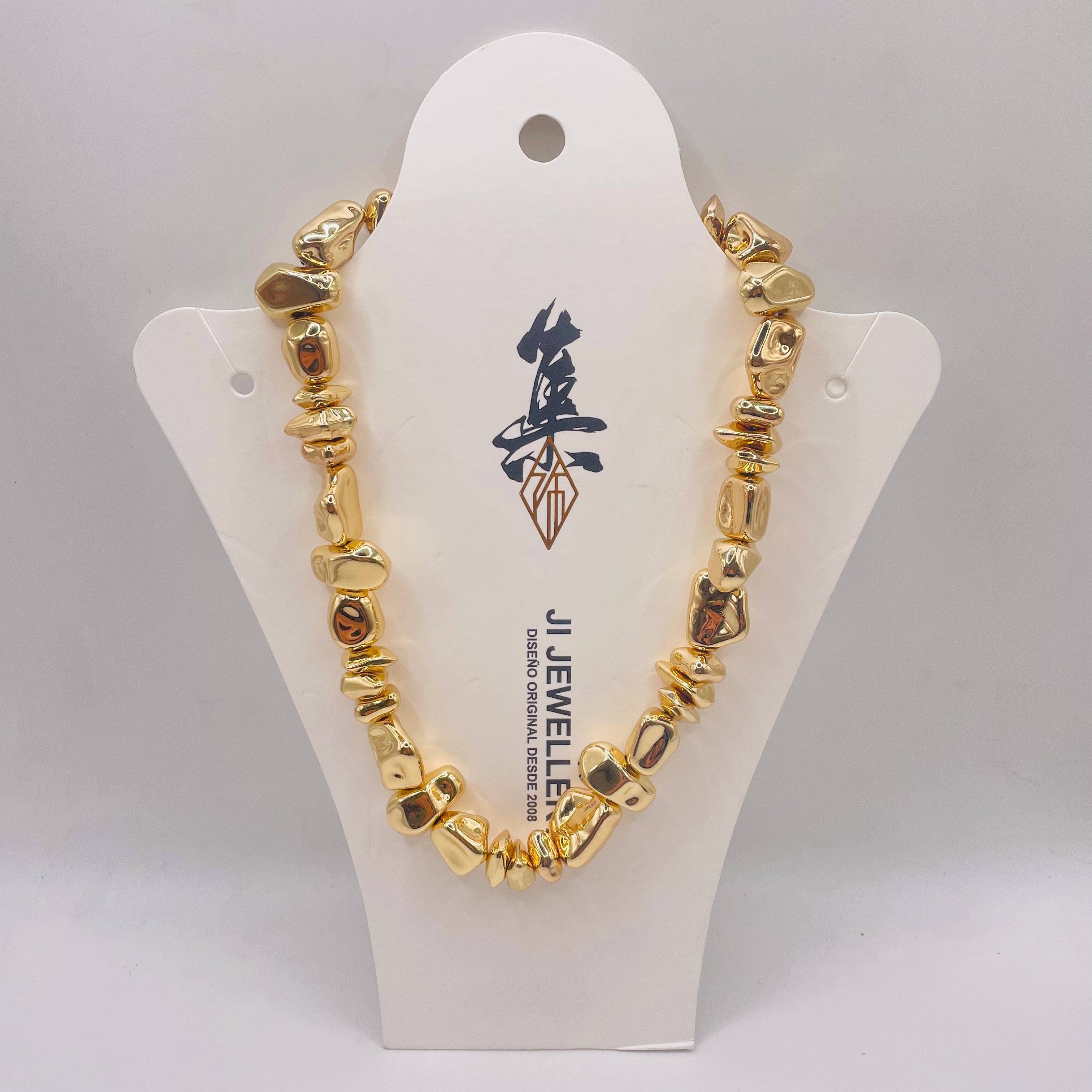 JI JOYA VENTA AL POR MAYOR|Set de Joyería Dorada Geométrica Irregular - Collar y Aretes de Zinc Dorado para Mujer | Venta al Por Mayor