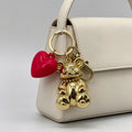 Llavero Oso Dorado con Corazón Rosa - Llavero de Moda para Bolsos y Llaves, Venta al Por Mayor|JI JOAY