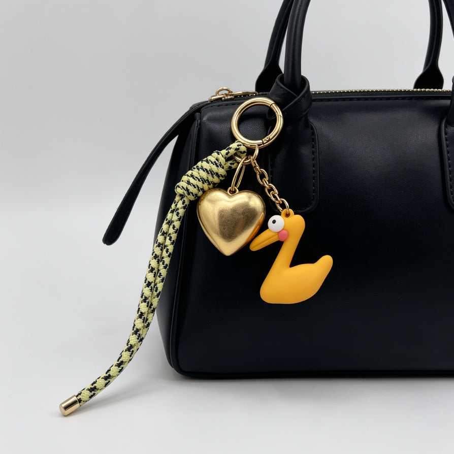 Llavero de Corazón Dorado y Cisne Amarillo - Accesorio de Moda para Llaveros, Pedidos al Por Mayor|JI JOYA