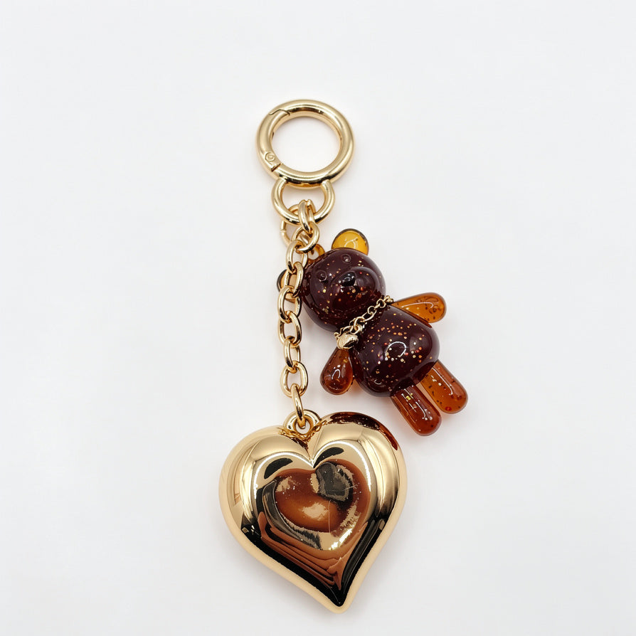 Llavero de Oso Glitter con Corazón Dorado - Accesorio de Moda para Bolsos, Venta al Por Mayor|JI JOYA