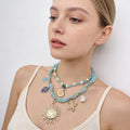 Conjunto de collar bohemio con capas de océano: collares con colgante de concha, estrella de mar y sol dorados para vacaciones de verano en la playa.