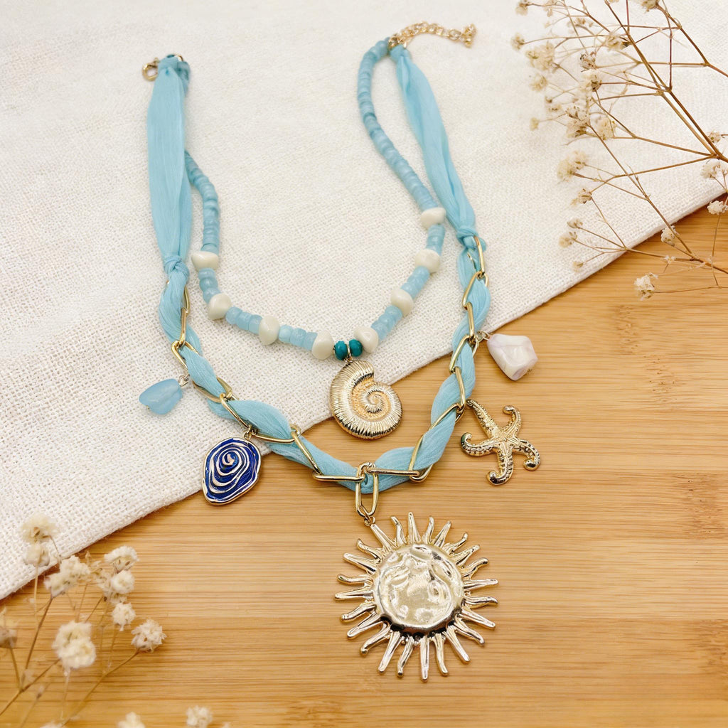 Conjunto de collar bohemio con capas de océano: collares con colgante de concha, estrella de mar y sol dorados para vacaciones de verano en la playa.